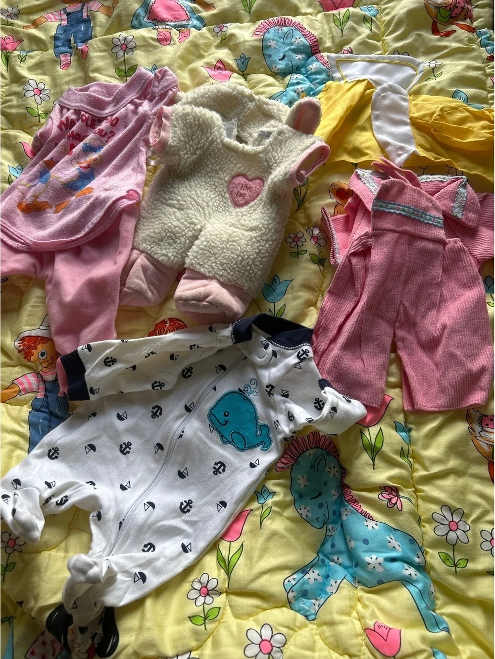 Assorted baby doll clothes